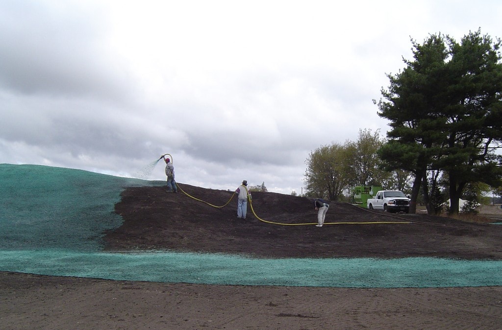 Hydroseeding a hillside at Macatawa Legends golf course