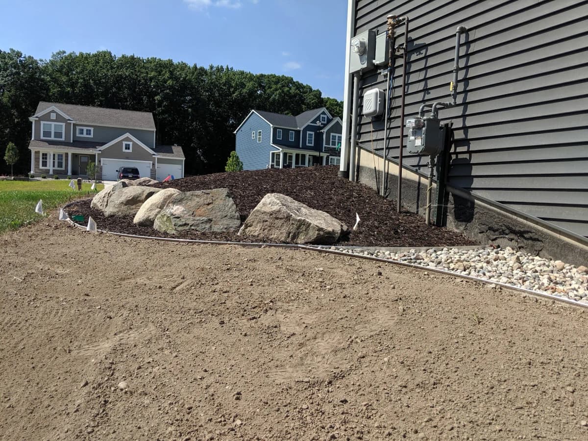 Soil preparation with boulder edging